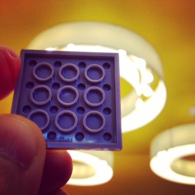 Even the light fixtures at LEGO Store exude the brand.