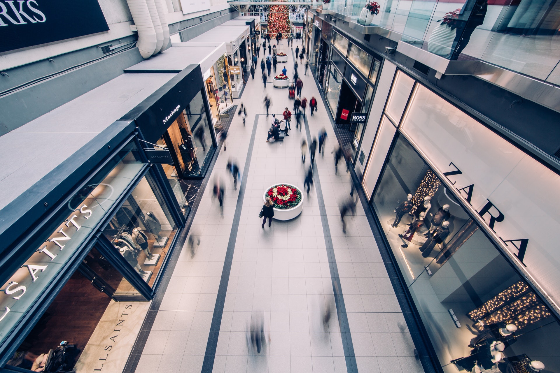 a shopping mall with shoppers