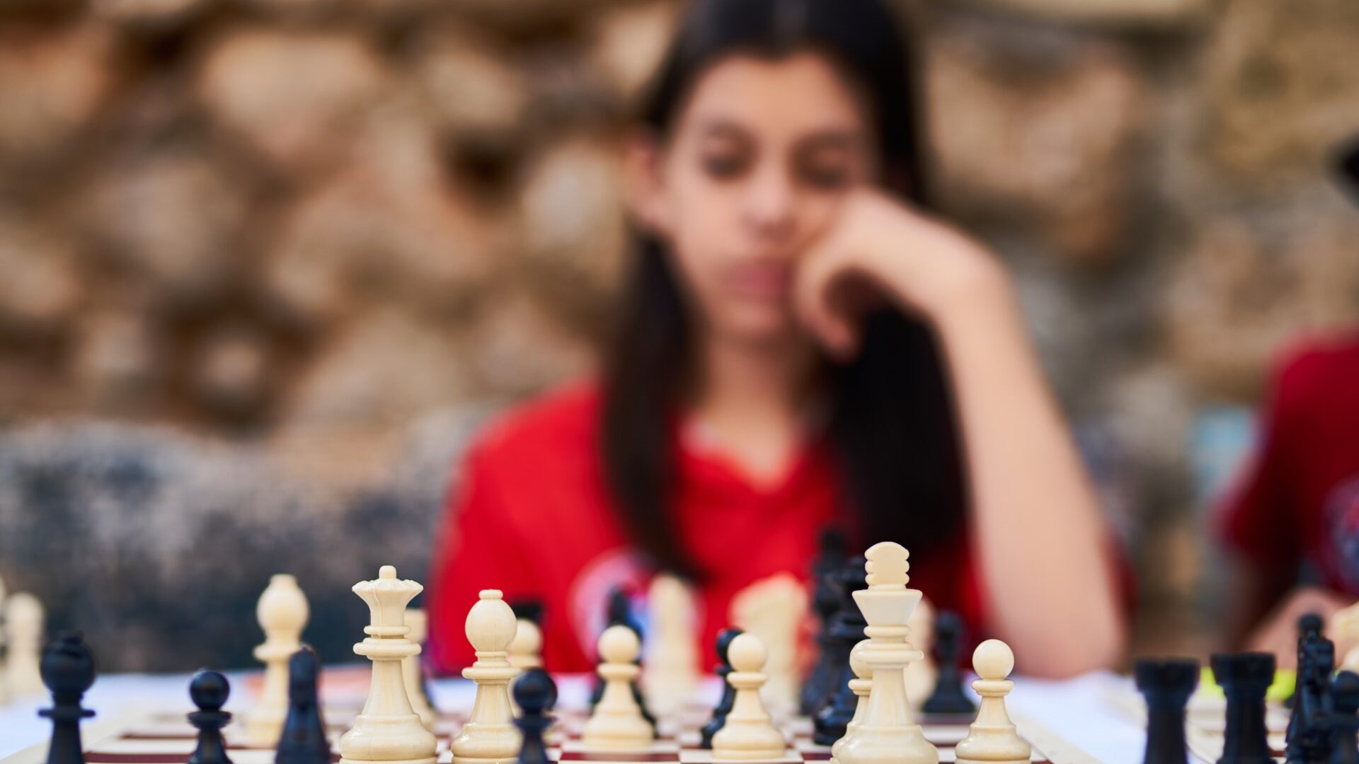 woman playing chess