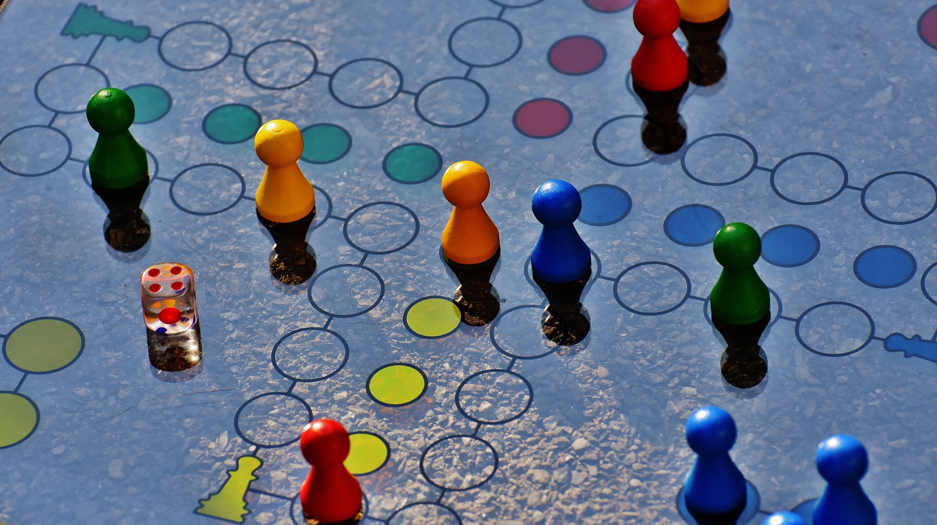 a board game with pieces on the board and dice