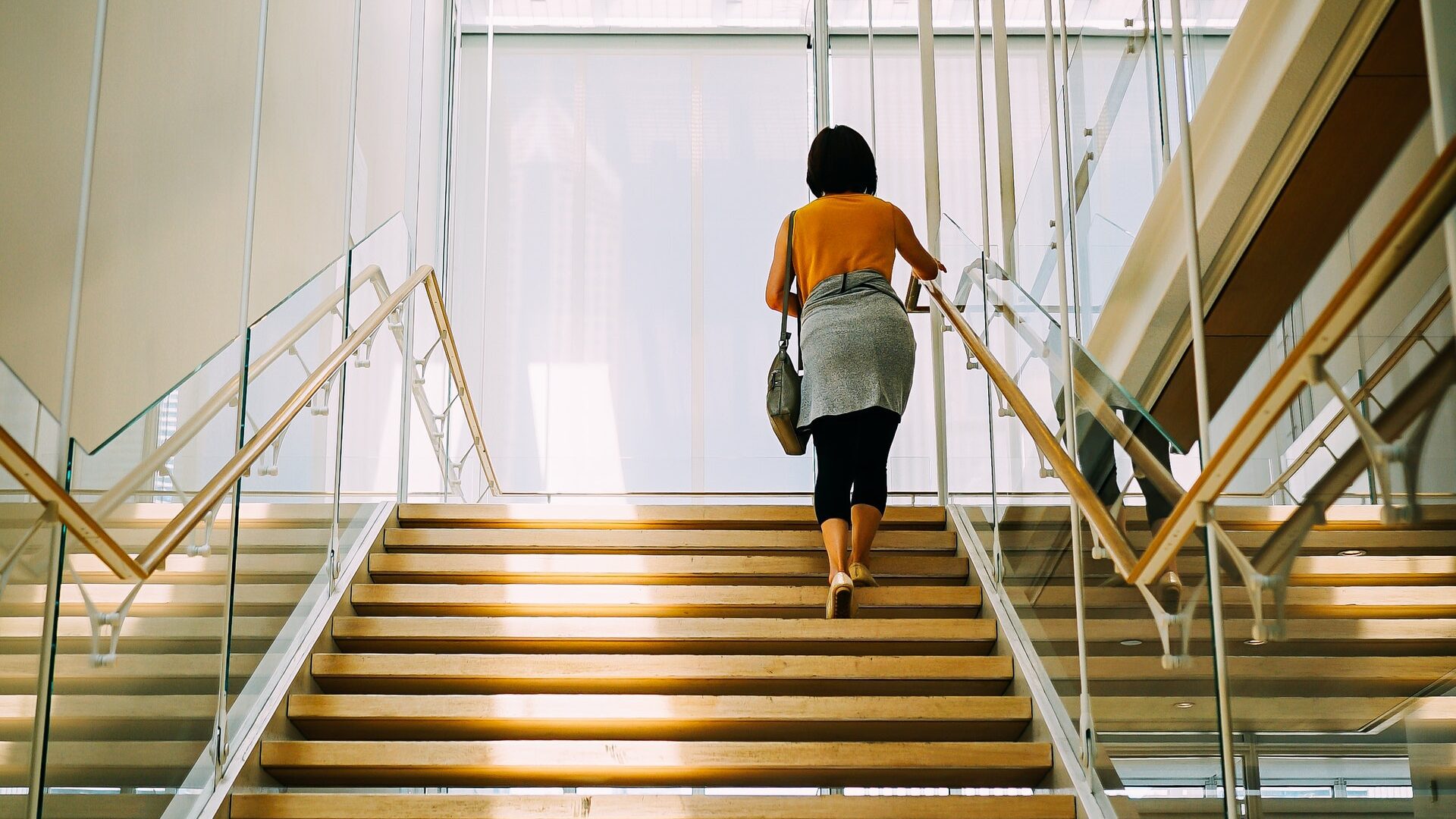 a woman climbing stairs