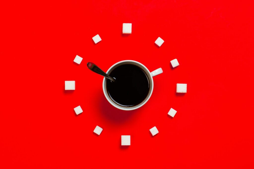White Mug on Red Background that looks like a clock