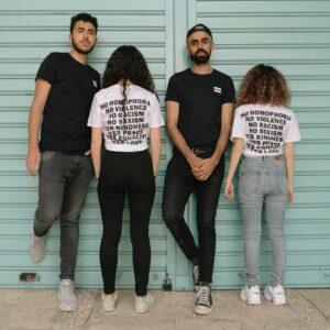 group of men and women wearing advocacy shirts