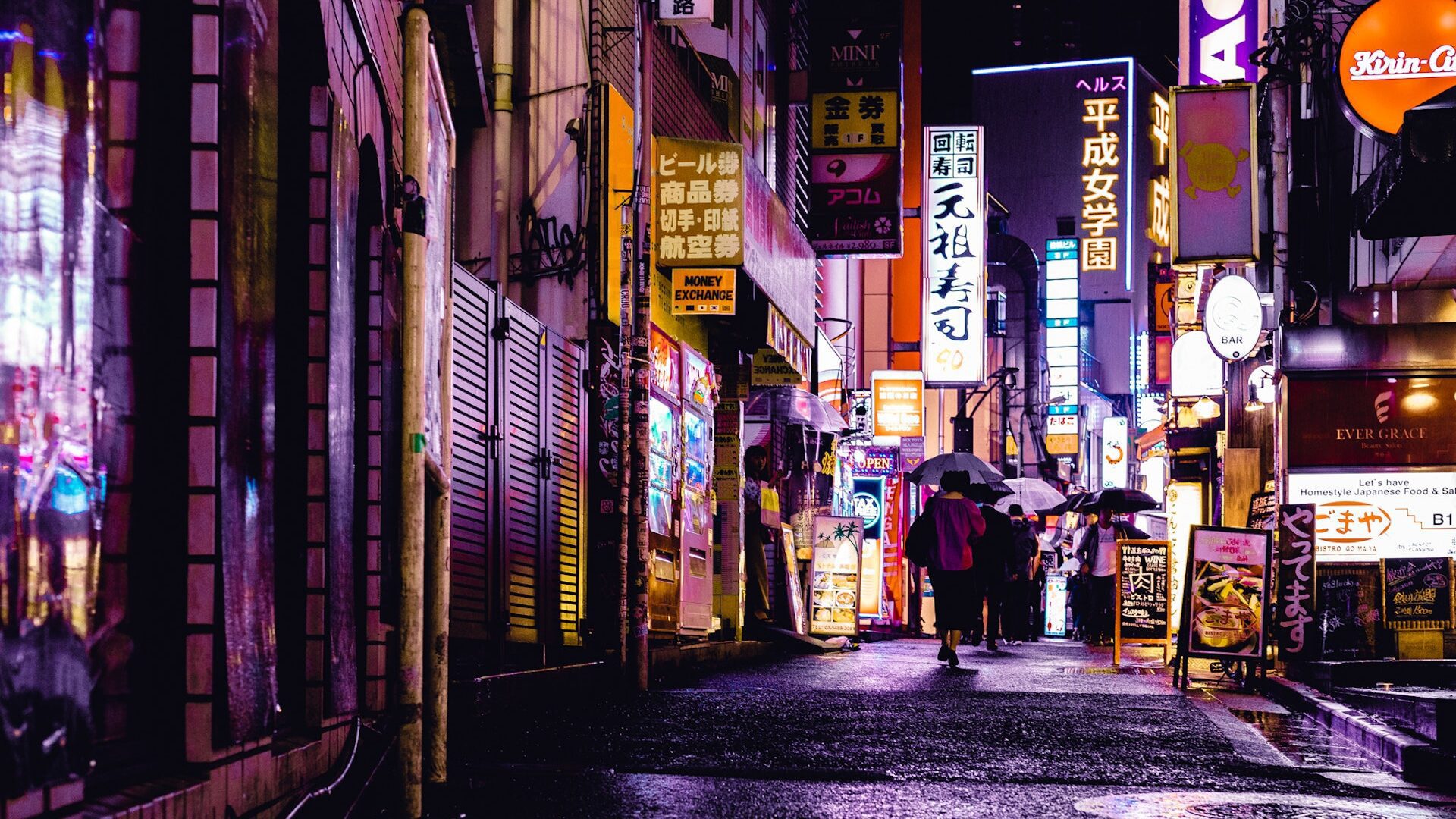 a wet city street in japan with glowing lights and wet streets - bright neon glows