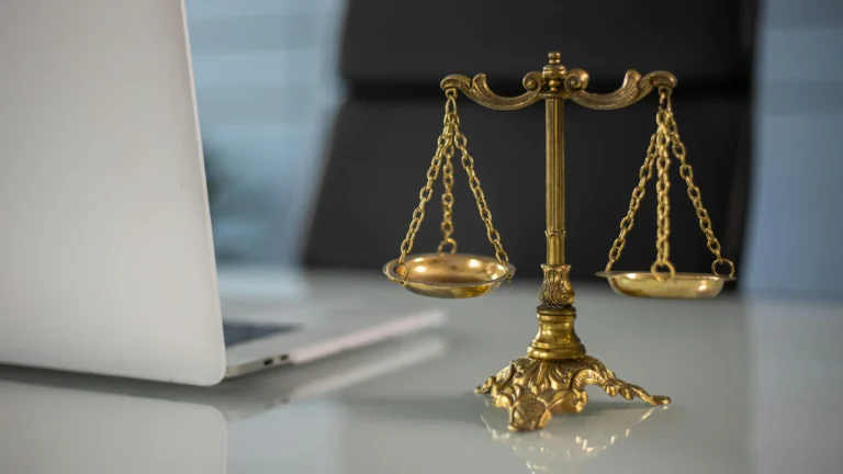 a golden set of scales on a table
